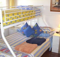 Calm Waters Waterfront Cottages - Accommodation Daintree