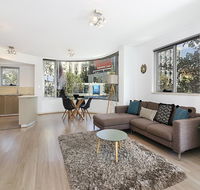 Lower Bridge and Sails - Executive 2BR Darlinghurst Apartment with Balcony and Rooftop Views - Accommodation Daintree