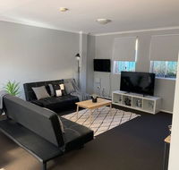 Cozy 3BR Townhouse in Liverpool CBD with parking - Accommodation Daintree