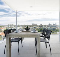 Minimalist Penthouse Condo with Skyline Vistas - Accommodation Daintree