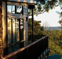 Rainforest Gardens - Luxury Hillside Chalets with Views to Bay  Islands - Accommodation Daintree