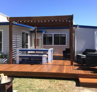 Shellharbour Beach Cottage - walk onto Patrolled beach with flags in summer - Accommodation Daintree