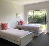 Spray Point Beach House entertaining deck - Accommodation Daintree