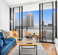 Sunny Modern Two-Bedroom Pad Steps From the Beach