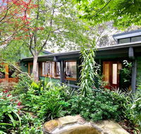 The Black Cockatoo - Secret Garden Mountains Home - Accommodation Daintree