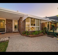 Woorim Secluded Palms Cottage - Accommodation Daintree