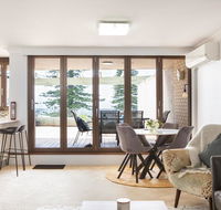 Beachfront Manly Apartment With Parking and Balcony - Accommodation Daintree
