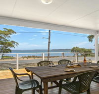 Bellevue - overlooking serene Lake Woolumboola - Accommodation Daintree